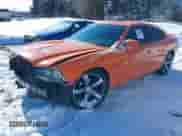 2014 Dodge Charger SXT with VIN 2C3CDXHG1EH219486, listed as a IAAI auction lot 41262265 with 117,949 mi miles and . Bid and sale history available at DreamBid. Image 2.