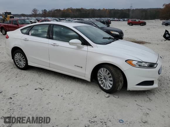 ✅ 2013 Ford Fusion SE Hybrid • VIN: 3FA6P0LU7DR382379 • Lot: 93236685. Listed on Copart with 126,145 mi. Free auction sales archive from the USA and detailed vehicle history report at DreamBid. Image 4.