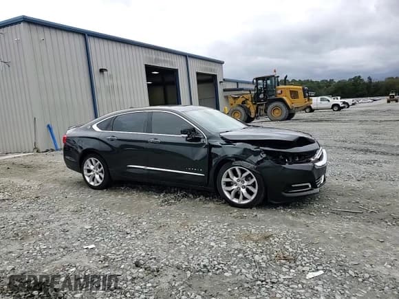 ✅ 2014 Chevrolet Impala LTZ • VIN: 1G1155S37EU126004 • Lot: 90404375. Listed on Copart with 203,095 mi. Free auction sales archive from the USA and detailed vehicle history report at DreamBid. Image 13.