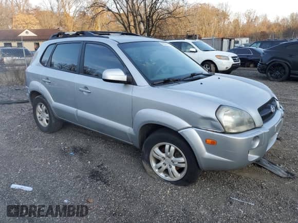2007 Hyundai Tucson SE z VIN KM8JN12D17U587870, wystawiony jako Copart lot #80851704 z przebiegiem 185 437 mil mil oraz Szkoda całkowita • Salvage title. Historia ofert i sprzedaży dostępna na DreamBid. Obrazek 4.