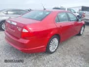 ✅ 2011 Ford Fusion Hybrid • VIN: 3FADP0L39BR308022 • Lot: 42351594. Listed on IAAI with 166,294 mi. Free auction sales archive from the USA and detailed vehicle history report at DreamBid. Image 4.