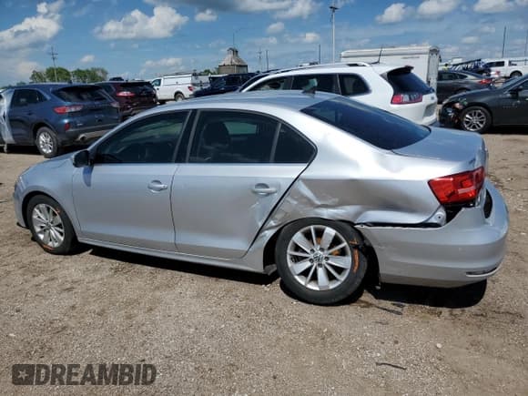 ✅ 2015 Volkswagen Jetta SE • VIN: 3VWD07AJ6FM232171 • Lot: 62503115. Listed on Copart with 82,745 mi. Free auction sales archive from the USA and detailed vehicle history report at DreamBid. Image 2.
