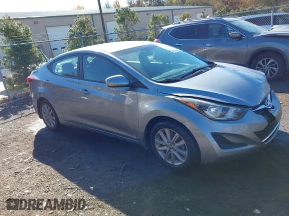 ✅ 2015 Hyundai Elantra SE • VIN: 5NPDH4AE6FH601310 • Lot: 43604408. Listed on IAAI with 91,970 mi. Free auction sales archive from the USA and detailed vehicle history report at DreamBid. Image 13.