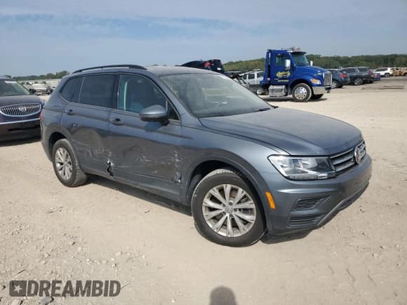 ✅ 2020 Volkswagen Tiguan S • VIN: 3VV1B7AX0LM157016 • Lot: 81953805. Listed on Copart with 66,644 mi. Free auction sales archive from the USA and detailed vehicle history report at DreamBid. Image 4.
