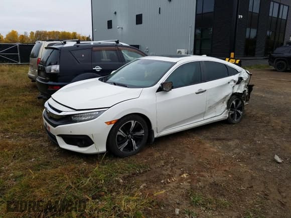 ✅ 2016 Honda Civic Touring • VIN: 2HGFC1F96GH100592 • Lot: 87394375. Listed on Copart with 225,190 mi. Free auction sales archive from the USA and detailed vehicle history report at DreamBid. Image 1.
