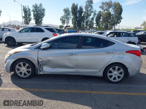 ✅ 2013 Hyundai Elantra GLS • VIN: KMHDH4AE5DU918428 • Lot: 43577973. Listed on IAAI with 116,708 mi. Free auction sales archive from the USA and detailed vehicle history report at DreamBid. Image 14.