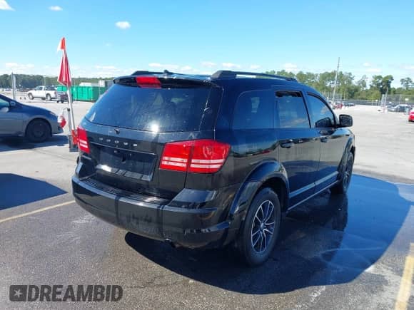 2017 Dodge Journey SE z VIN 3C4PDCAB4HT630221, wystawiony jako IAAI lot #43423577 z przebiegiem 126 030 mil mil oraz . Historia ofert i sprzedaży dostępna na DreamBid. Obrazek 4.