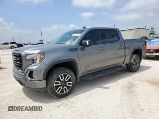 ✅ 2021 GMC Sierra 1500 AT4 • VIN: 3GTP9EED7MG419946 • Лот: 54617445. Опубликован ранее на Copart с пробегом 88 363 миль. Бесплатный доступ к архиву аукционных продаж из США и подробный отчёт об истории автомобиля на DreamBid. Изображение 1.
