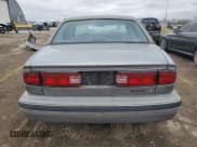 ✅ 1992 Buick LeSabre Ltd • VIN: 1G4HR53L2NH557010 • Lot: 49856195. Wystawiony na Copart z przebiegiem 167 167 mil. Bezpłatny archiwum sprzedaży aukcyjnych z USA i szczegółowy raport historii pojazdu na DreamBid. Zdjęcie 6.