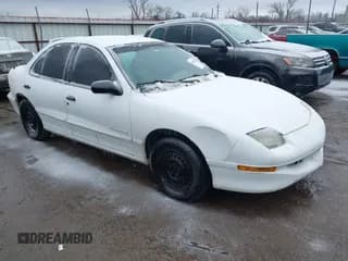 ✅ 1996 Pontiac Sunfire SE • VIN: 1G2JB5247T7565776 • Lot: 41560112. Listed on IAAI with 73,286 mi. Free auction sales archive from the USA and detailed vehicle history report at DreamBid. Image 1.