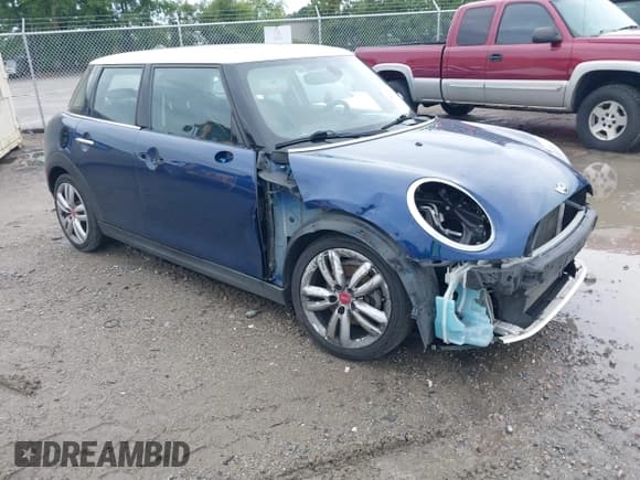 ✅ 2017 MINI Hardtop 4 Door Cooper • VIN: WMWXU1C54H2E17900 • Lot: 42917336. Listed on IAAI with 84,683 mi. Free auction sales archive from the USA and detailed vehicle history report at DreamBid. Image 1.