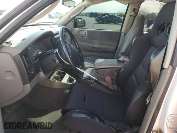 2002 Dodge Dakota SLT z VIN 1B7HL48X82S661284, wystawiony jako Copart lot #59824025 z przebiegiem 187 222 mil mil oraz Szkoda całkowita • Salvage title. Historia ofert i sprzedaży dostępna na DreamBid. Obrazek 7.