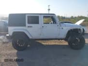 ✅ 2012 Jeep Wrangler Unlimited Sahara • VIN: 1C4BJWEG9CL127427 • Lot: 43182033. Listed on IAAI with 187,760 mi. Free auction sales archive from the USA and detailed vehicle history report at DreamBid. Image 14.