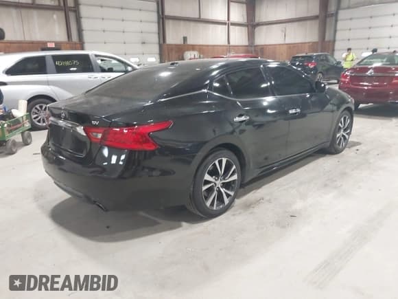 ✅ 2016 Nissan Maxima S • VIN: 1N4AA6AP1GC415794 • Lot: 42789849. Listed on IAAI with 150,496 mi. Free auction sales archive from the USA and detailed vehicle history report at DreamBid. Image 4.