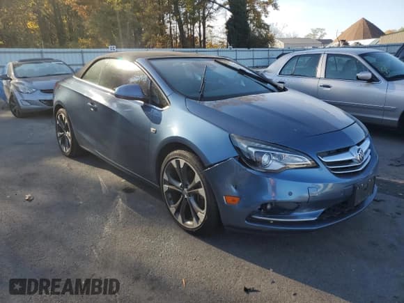 ✅ 2016 Buick Cascada Premium • VIN: W04WT3N52GG053348 • Лот: 74945434. Опубликован ранее на Copart с пробегом 72 876 миль. Бесплатный доступ к архиву аукционных продаж из США и подробный отчёт об истории автомобиля на DreamBid. Изображение 4.