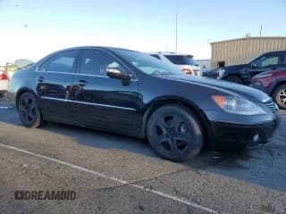 ✅ 2007 Acura RL • VIN: JH4KB16577C001813 • Лот: 74492884. Опубликован ранее на Copart с пробегом 400 177 миль. Бесплатный доступ к архиву аукционных продаж из США и подробный отчёт об истории автомобиля на DreamBid. Изображение 4.