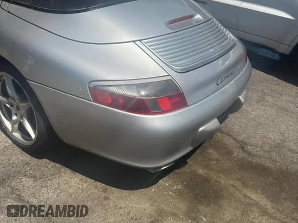 ✅ 2004 Porsche 911 • VIN: WP0CA299X4565153 • Lot: 59790335. Listed on Copart with 55,045 mi. Free auction sales archive from the USA and detailed vehicle history report at DreamBid. Image 4.