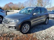 ✅ 2013 Volkswagen Tiguan S • VIN: WVGBV3AXXDW585174 • Lot: 93643875. Listed on Copart with 143,089 mi. Free auction sales archive from the USA and detailed vehicle history report at DreamBid. Image 1.