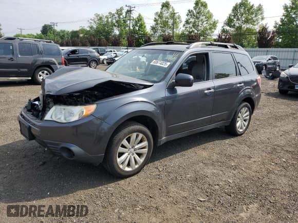 ✅ 2013 Subaru Forester X Premium • VIN: JF2SHADC8DH429777 • Lot: 60674025. Listed on Copart with 162,835 mi. Free auction sales archive from the USA and detailed vehicle history report at DreamBid. Image 1.