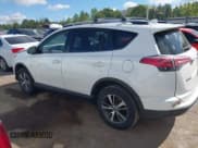 ✅ 2016 Toyota RAV4 XLE • VIN: JTMWFREVXGJ077657 • Lot: 43300105. Listed on IAAI with 140,754 mi. Free auction sales archive from the USA and detailed vehicle history report at DreamBid. Image 14.