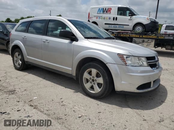 ✅ 2013 Dodge Journey SE • VIN: 3C4PDCAB6DT547576 • Lot: 61237395. Listed on Copart with 171,323 mi. Free auction sales archive from the USA and detailed vehicle history report at DreamBid. Image 4.