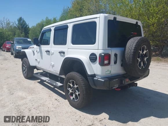 ✅ 2021 Jeep Wrangler Unlimited Rubicon • VIN: 1C4HJXFG5MW586842 • Lot: 42186683. Listed on IAAI with 76,450 mi. Free auction sales archive from the USA and detailed vehicle history report at DreamBid. Image 3.