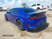 ✅ 2022 Dodge Charger Scat Pack Widebody • VIN: 2C3CDXGJ3NH121752 • Лот: 43407355. Опубликован ранее на IAAI с пробегом 62 632 миль. Бесплатный доступ к архиву аукционных продаж из США и подробный отчёт об истории автомобиля на DreamBid. Изображение 3.