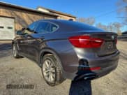 ✅ 2018 BMW X6 xDrive35i • VIN: 5UXKU2C5XJ0Z62161 • Лот: 95188025. Опубликован ранее на Copart с пробегом 124 551 миль. Бесплатный доступ к архиву аукционных продаж из США и подробный отчёт об истории автомобиля на DreamBid. Изображение 3.