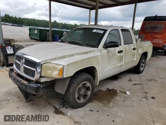 2005 Dodge Dakota ST with VIN 1D7HE28K75S151411, listed as a Copart auction lot 58223775 with 218,017 mi miles and Clean title. Bid and sale history available at DreamBid. Image 1.