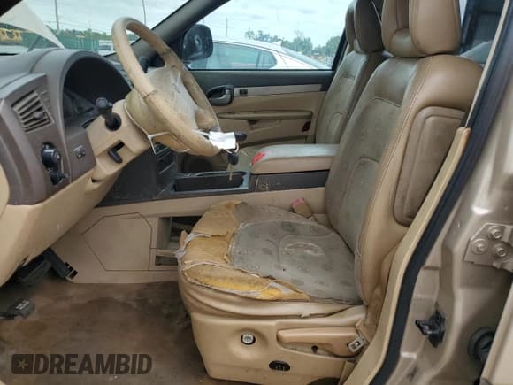 ✅ 2003 Buick Rendezvous CX • VIN: 3G5DA03E93S511202 • Лот: 81291915. Опубликован ранее на Copart с пробегом Не указан. Бесплатный доступ к архиву аукционных продаж из США и подробный отчёт об истории автомобиля на DreamBid. Изображение 7.