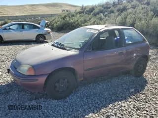 ✅ 1996 Geo Metro • VIN: 2C1MR2296T6778911 • Lot: 50937725. Listed on Copart with 157,821 mi. Free auction sales archive from the USA and detailed vehicle history report at DreamBid. Image 1.