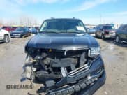 ✅ 2015 Lincoln Navigator • VIN: 5LMJJ3JT3FEJ00335 • Lot: 41585554. Listed on IAAI with 163,841 mi. Free auction sales archive from the USA and detailed vehicle history report at DreamBid. Image 6.