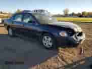 2009 Chevrolet Impala LS with VIN 2G1WB57KX91219020, listed as a Copart auction lot 85953935 with 176,265 mi miles and Salvage title. Bid and sale history available at DreamBid. Image 4.