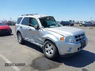 ✅ 2011 Ford Escape Hybrid • VIN: 1FMCU4K33BKB53300 • Lot: 42561682. Listed on IAAI with 144,628 mi. Free auction sales archive from the USA and detailed vehicle history report at DreamBid. Image 1.