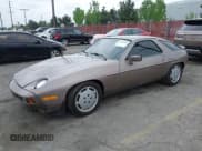 ✅ 1983 Porsche 928 • VIN: WP0JB0928DS860094 • Лот: 42106022. Опубликован ранее на IAAI с пробегом 121 873 миль. Бесплатный доступ к архиву аукционных продаж из США и подробный отчёт об истории автомобиля на DreamBid. Изображение 2.