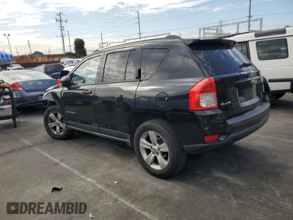 ✅ 2012 Jeep Compass Latitude • VIN: 1C4NJDEB5CD633448 • Lot: 87109675. Listed on Copart with 100,653 mi. Free auction sales archive from the USA and detailed vehicle history report at DreamBid. Image 2.