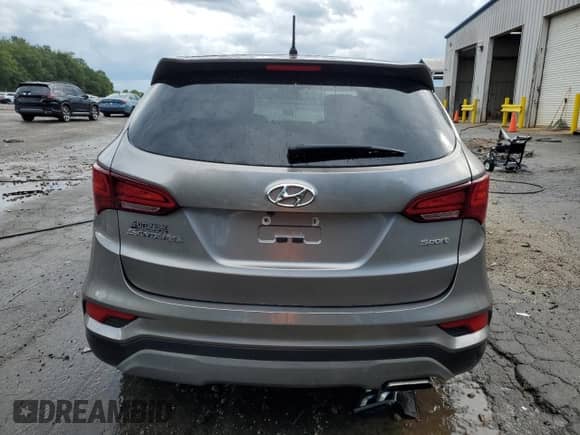 2018 Hyundai Santa Fe 2.4L with VIN 5XYZT3LB2JG559137, listed as a Copart auction lot 83994075 with 121,622 mi miles and Salvage title. Bid and sale history available at DreamBid. Image 6.
