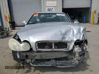 2004 Hyundai Sonata GLS z VIN KMHWF35H34A940619, wystawiony jako Copart lot #51607865 z przebiegiem 192 742 mil mil oraz Szkoda całkowita • Salvage title. Historia ofert i sprzedaży dostępna na DreamBid. Obrazek 5.