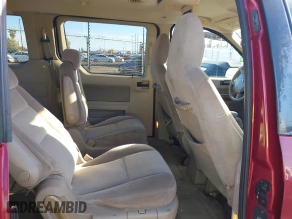 ✅ 2005 Ford Freestar • VIN: 2FMDA57655BA39691 • Lot: 43442137. Listed on IAAI with 192,705 mi. Free auction sales archive from the USA and detailed vehicle history report at DreamBid. Image 8.
