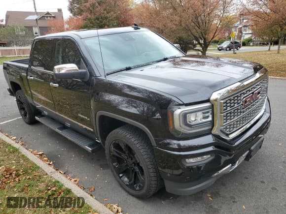 ✅ 2018 GMC Sierra 1500 Denali • VIN: 3GTU2PECXJG521358 • Лот: 91446635. Опубликован ранее на Copart с пробегом 9 940 миль. Бесплатный доступ к архиву аукционных продаж из США и подробный отчёт об истории автомобиля на DreamBid. Изображение 1.