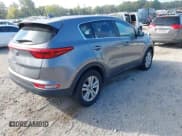 ✅ 2018 Kia Sportage LX • VIN: KNDPM3AC8J7445379 • Lot: 43383439. Listed on IAAI with 98,145 mi. Free auction sales archive from the USA and detailed vehicle history report at DreamBid. Image 4.