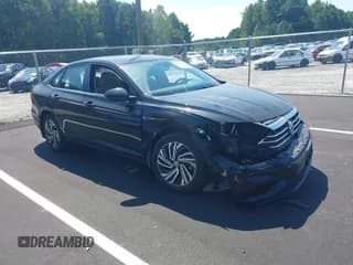 ✅ 2021 Volkswagen Jetta SEL • VIN: 3VWE57BUXMM084456 • Лот: 43057929. Опубликован ранее на IAAI с пробегом 26 185 миль. Бесплатный доступ к архиву аукционных продаж из США и подробный отчёт об истории автомобиля на DreamBid. Изображение 1.