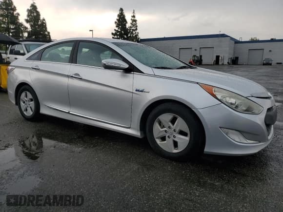 ✅ 2012 Hyundai Sonata Hybrid • VIN: KMHEC4A40CA030499 • Lot: 59590825. Listed on Copart with 125,184 mi. Free auction sales archive from the USA and detailed vehicle history report at DreamBid. Image 4.