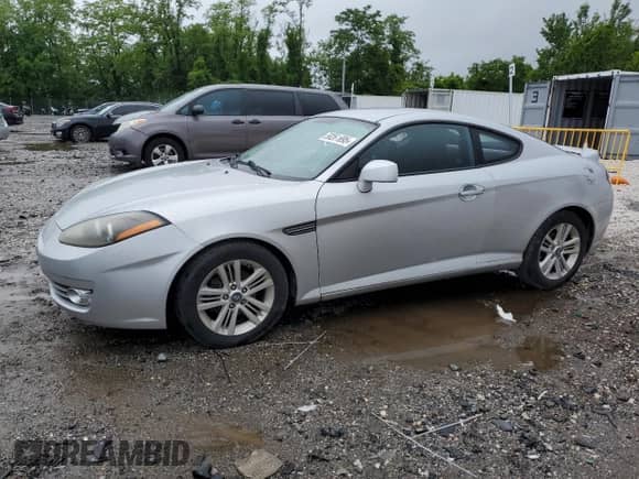 2008 Hyundai Tiburon GS с VIN KMHHM66D68U288062, выставлен на аукционе Copart как лот 58261695 с пробегом 130 310 миль миль и Чистый • Clean title. История ставок и продаж доступна на DreamBid. Изображение 1.