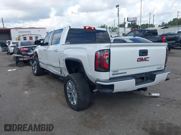 ✅ 2017 GMC Sierra 1500 Denali • VIN: 3GTU2PEJ9HG395566 • Lot: 43288882. Listed on IAAI with 87,680 mi. Free auction sales archive from the USA and detailed vehicle history report at DreamBid. Image 3.
