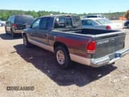 ✅ 2001 Dodge Dakota Sport • VIN: 1B7HL2ANX1S297770 • Lot: 42309715. Wystawiony na IAAI z przebiegiem 279 458 mil. Bezpłatny archiwum sprzedaży aukcyjnych z USA i szczegółowy raport historii pojazdu na DreamBid. Zdjęcie 3.