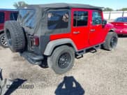 ✅ 2015 Jeep Wrangler Unlimited Sport • VIN: 1C4BJWDG1FL676979 • Lot: 43571068. Listed on IAAI with 203,004 mi. Free auction sales archive from the USA and detailed vehicle history report at DreamBid. Image 4.