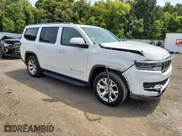 ✅ 2022 Jeep Wagoneer Series I • VIN: 1C4SJUATXNS207237 • Lot: 71671965. Listed on Copart with 94,886 mi. Free auction sales archive from the USA and detailed vehicle history report at DreamBid. Image 4.