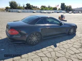 ✅ 2005 Mercedes-Benz SL 500 • VIN: WDBSK75F75F094230 • Лот: 80403445. Опубликован ранее на Copart с пробегом 191 895 миль. Бесплатный доступ к архиву аукционных продаж из США и подробный отчёт об истории автомобиля на DreamBid. Изображение 3.