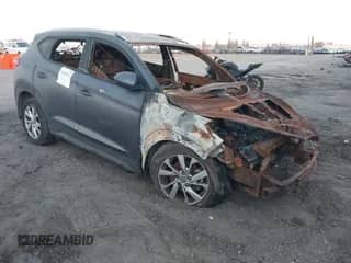 2021 Hyundai Tucson Value with VIN KM8J3CA47MU292237, listed as a IAAI auction lot 41302323 with Not provided miles and . Bid and sale history available at DreamBid. Image 1.